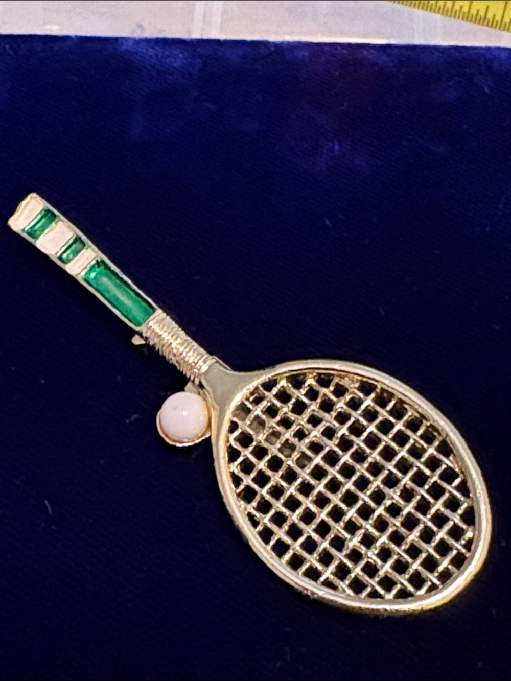 Vintage Gerry’s tennis racket with ball brooch, or pendant, gold tone